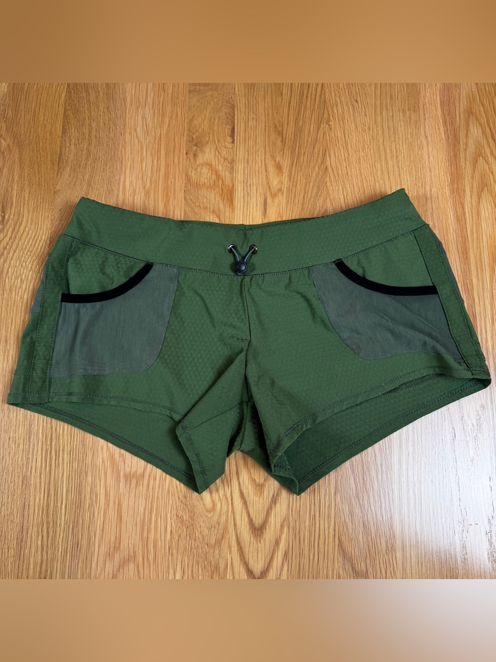oiselle Pockito Olive Green Running Shorts with Contrast Pockets
